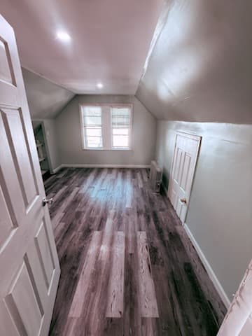 Attic Drywall Over Spray Foam, Plaster-Smooth Finish & Custom Built-In Bookshelf