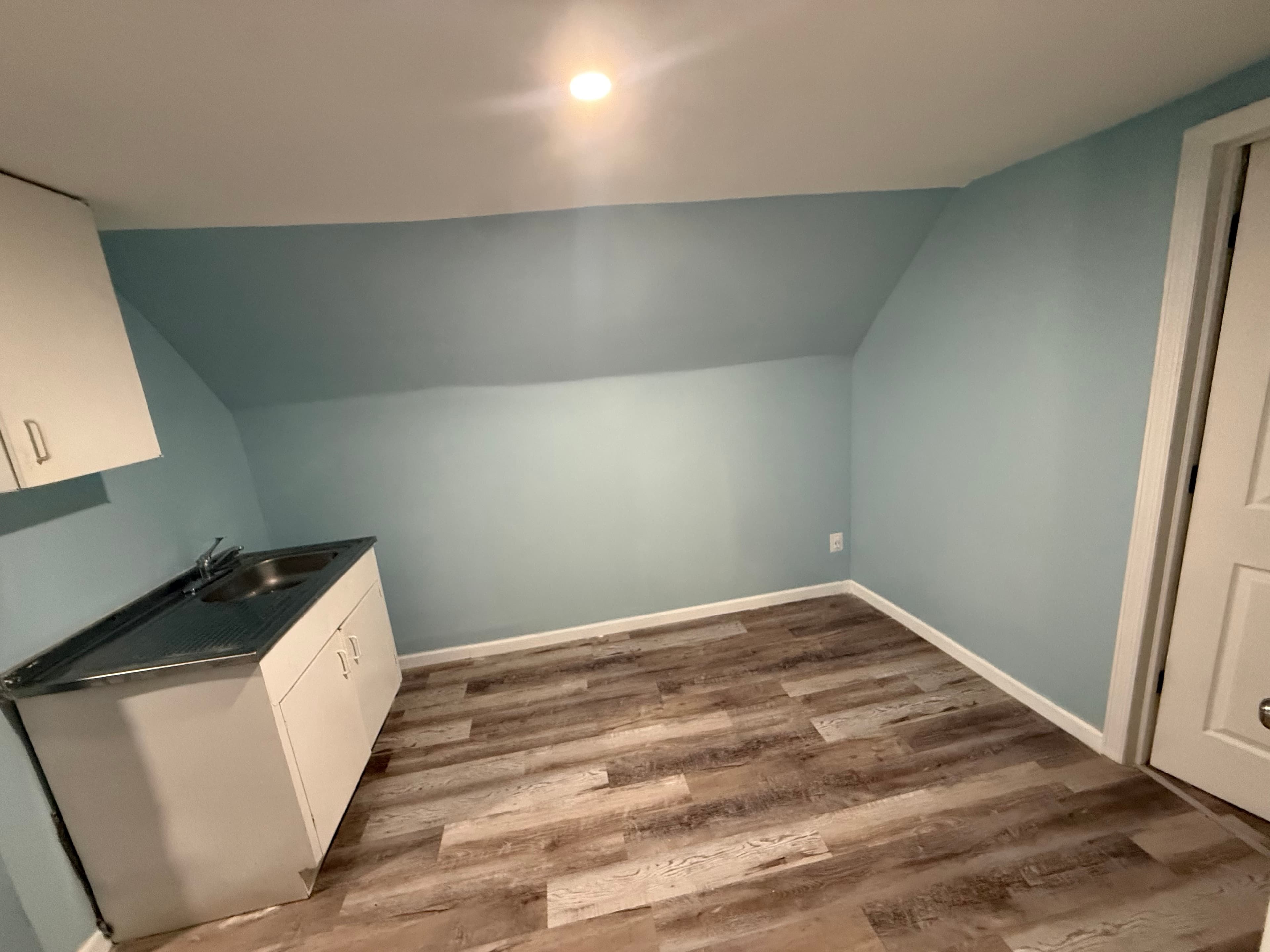Attic Drywall Over Spray Foam, Plaster-Smooth Finish & Custom Built-In Bookshelf