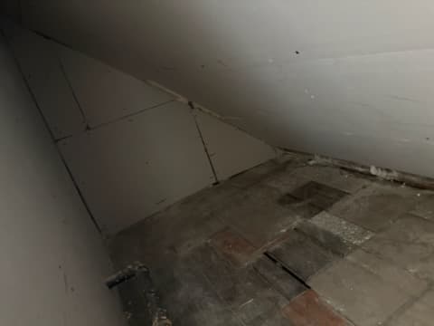 During: applying the finish coat to the drywall.