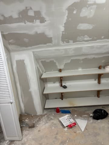 During: drywall hung across the knee and gable ceilings.