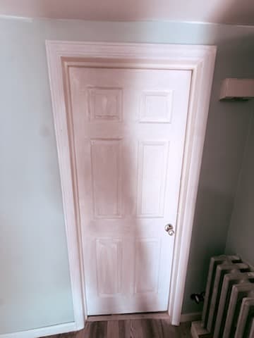 After: the flat front-room ceiling finished and painted.