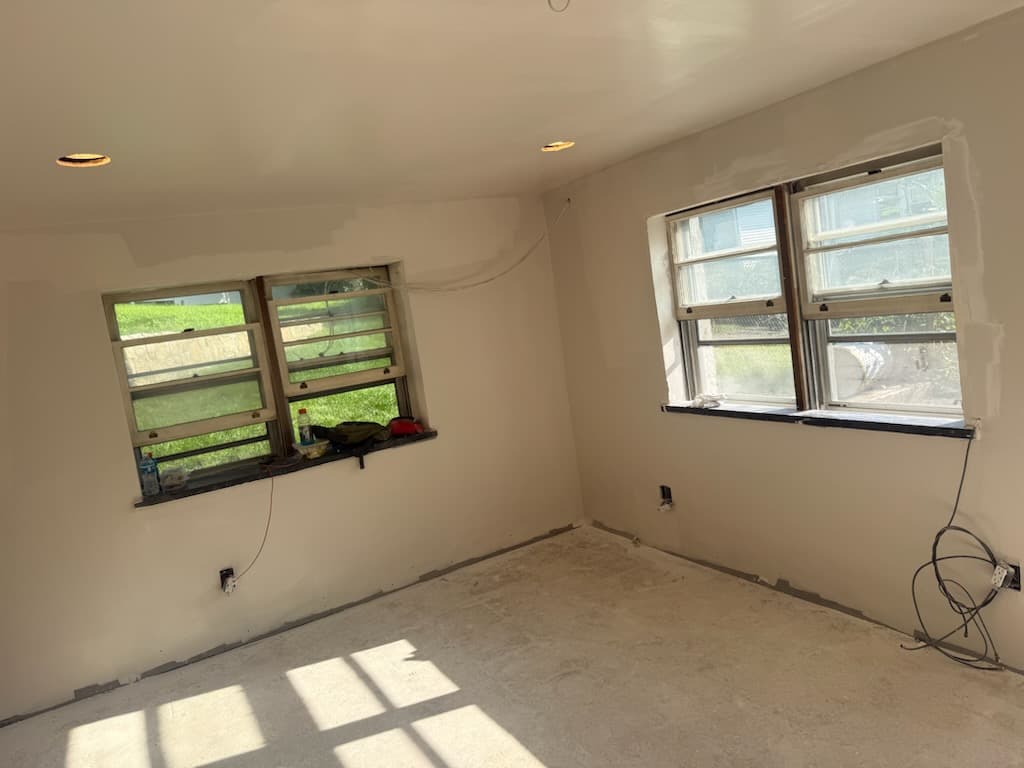 Basement Drywall Over Paneling with Orange-Peel Texture & Framing Repair