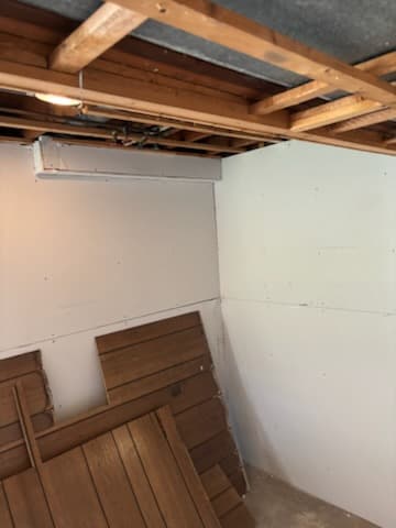 During: the basement walls ready for paint.