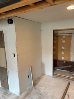 During: framing repair along a basement wall.
