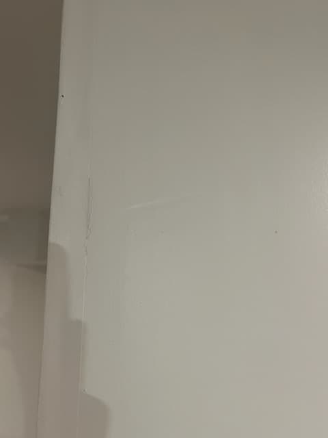 During: joint compound applied to the basement walls.