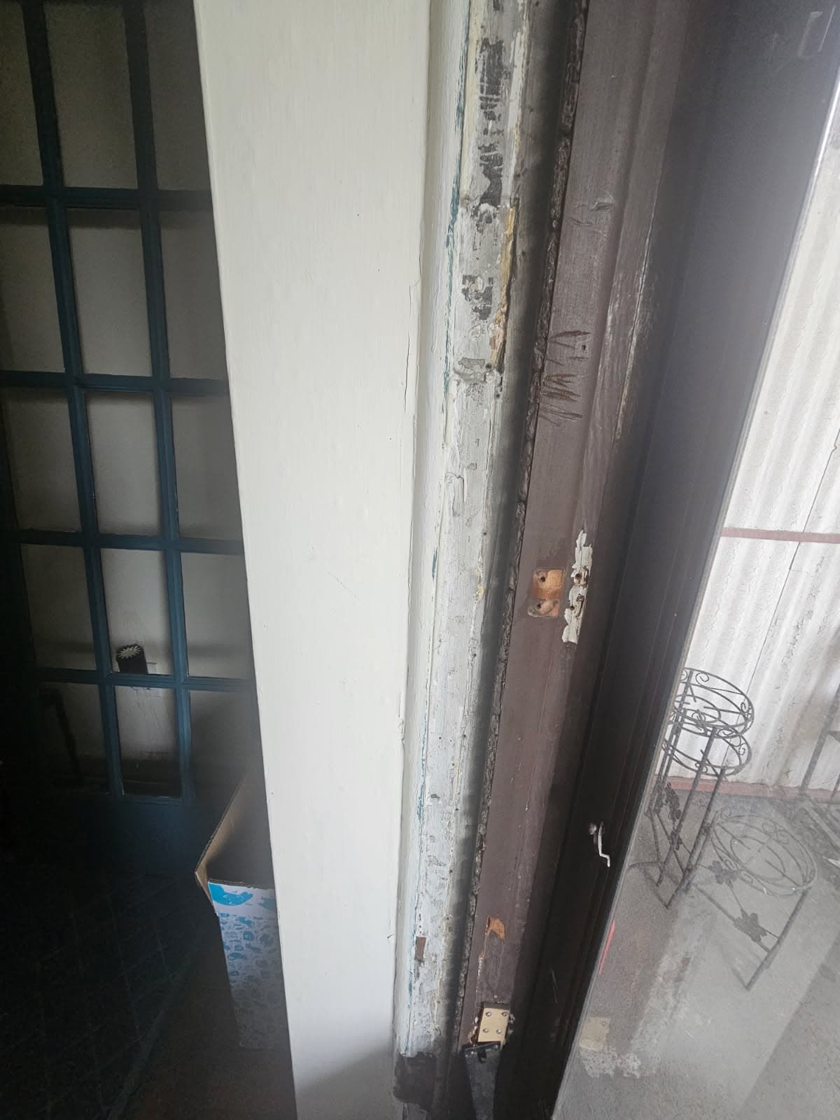 Balcony Door Rehang with Rotted Wood Panel Replacement
